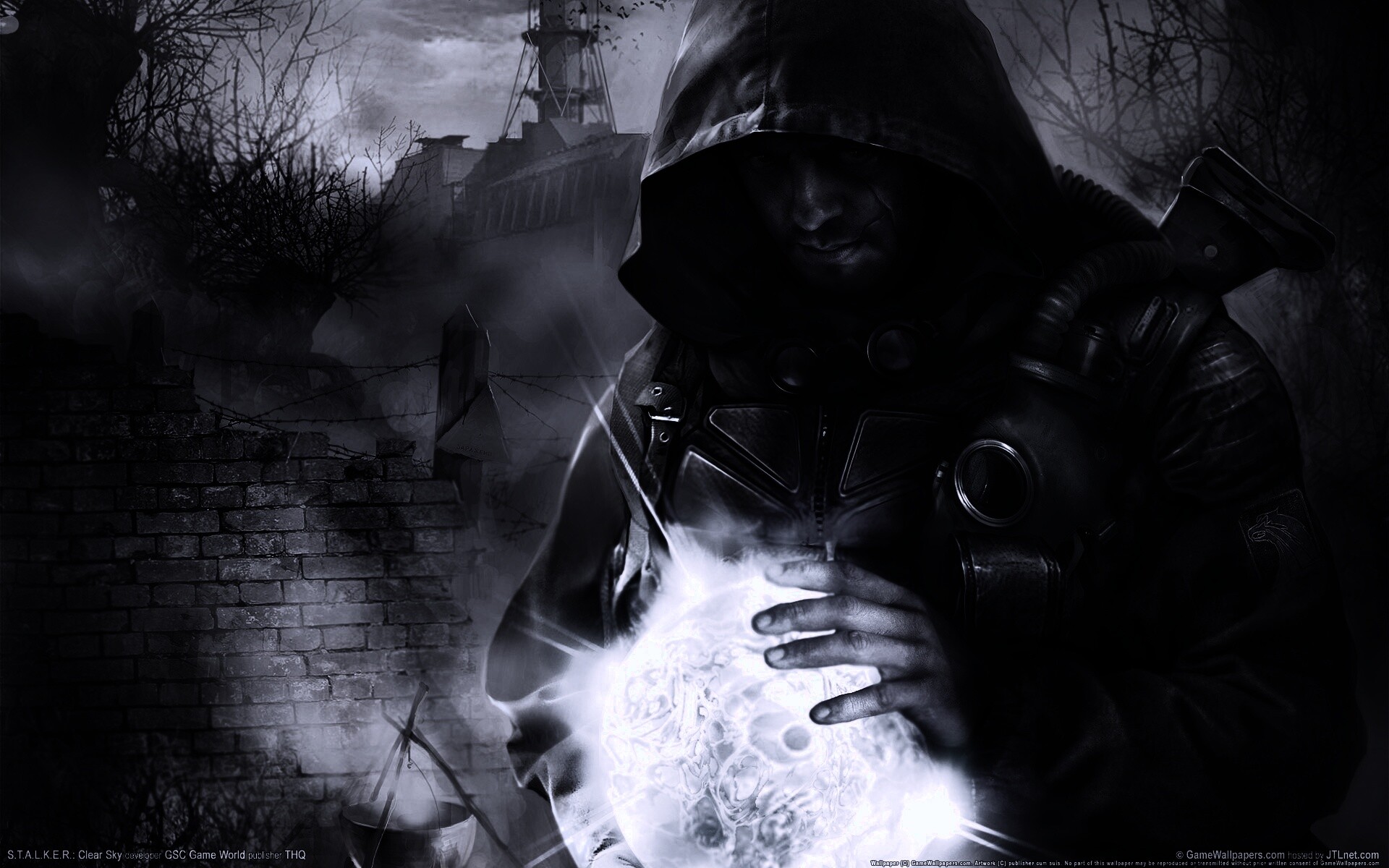 Сталкер с энергетическим артефактом в руках обои