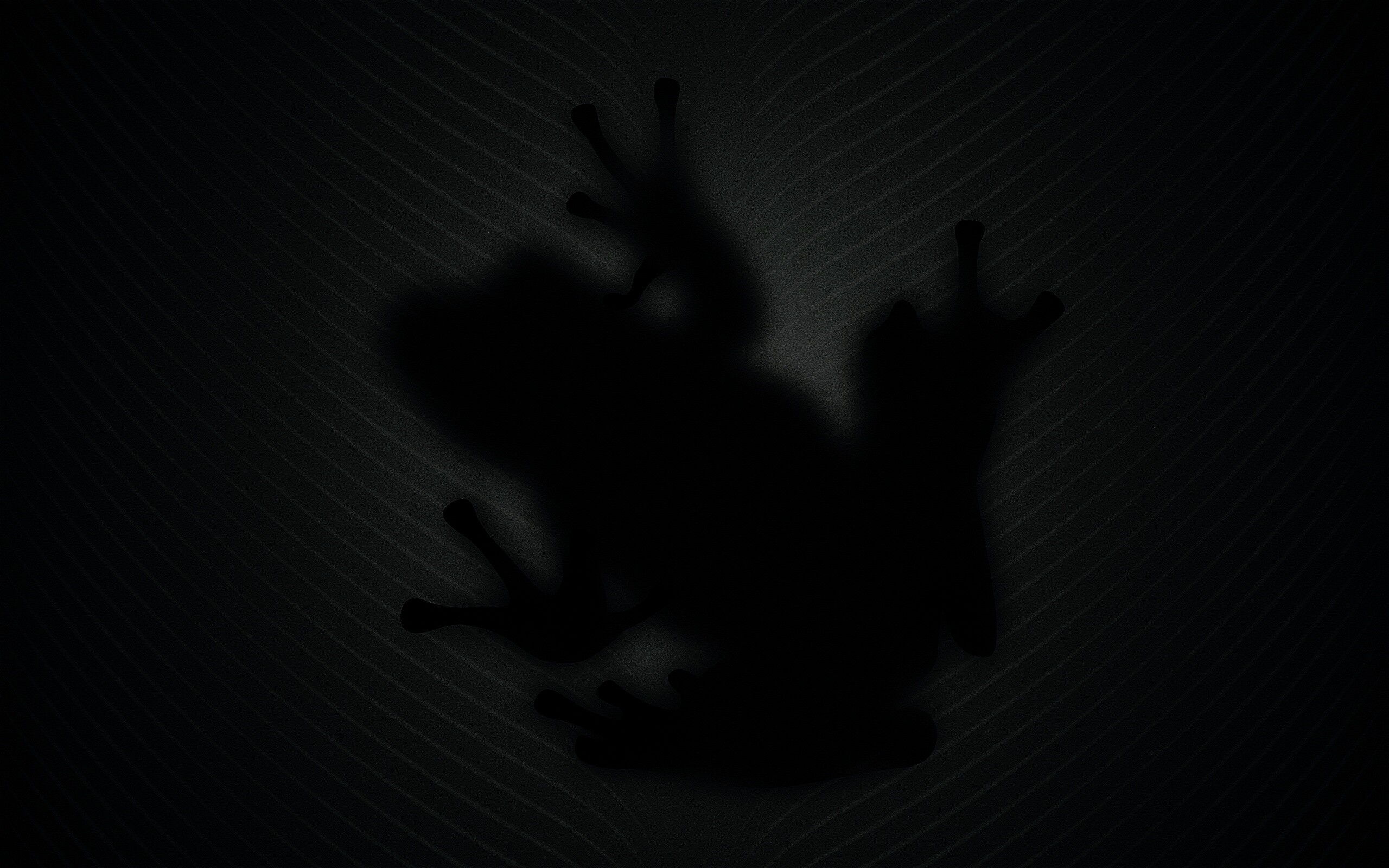 Силуэт лягушки просвечивает сквозь зеленый лист обои