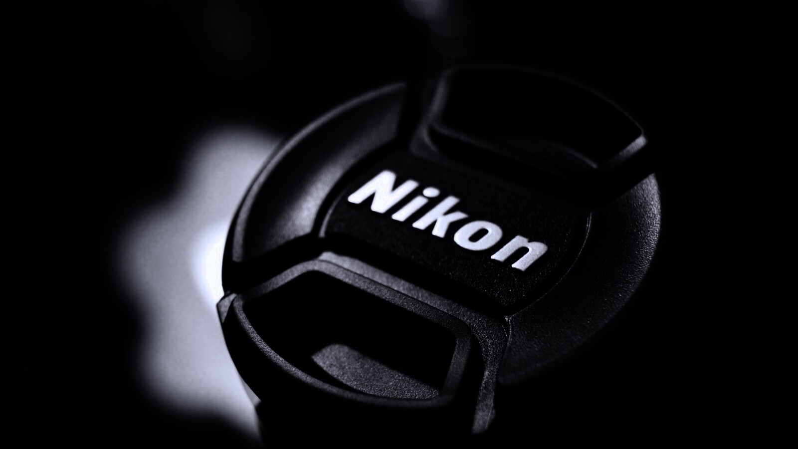 Крышечка от объектива Nikon обои