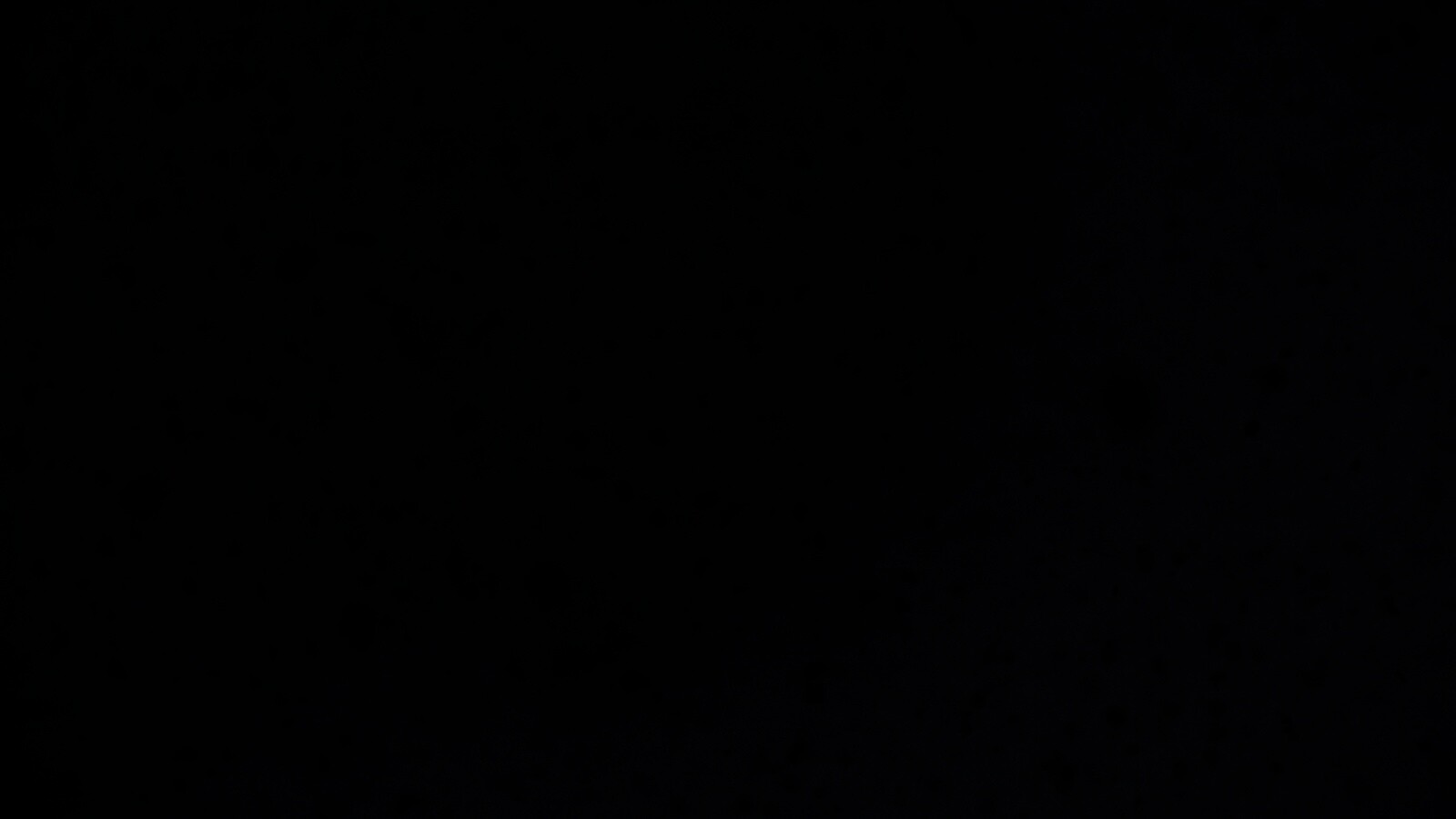 Черные пятна на сером фоне обои