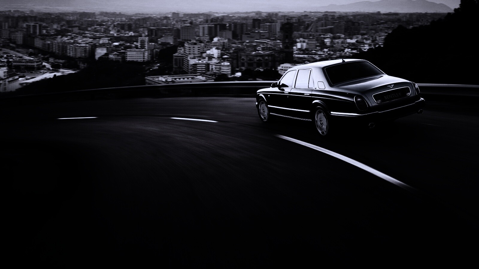 Черный Бентли на повороте обои