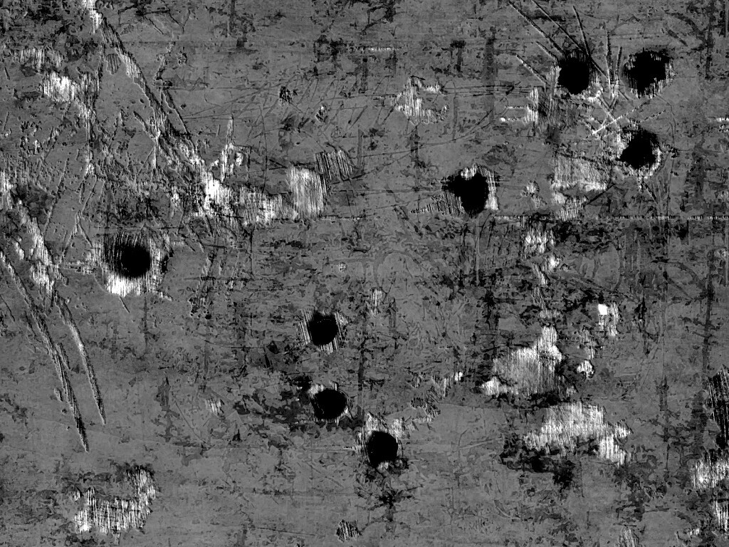 Пулевые отверстия в желтом листе обои