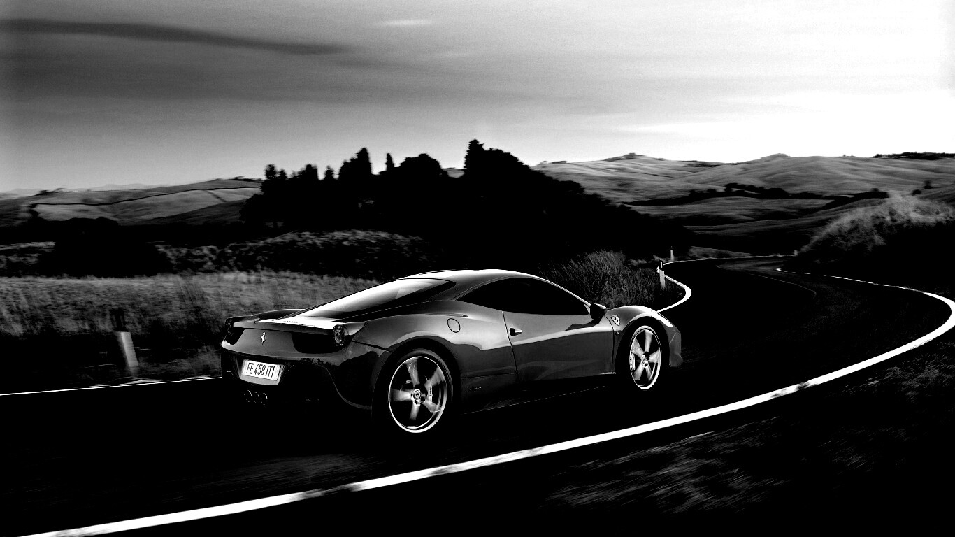 Красная феррари на извилистой дороге обои