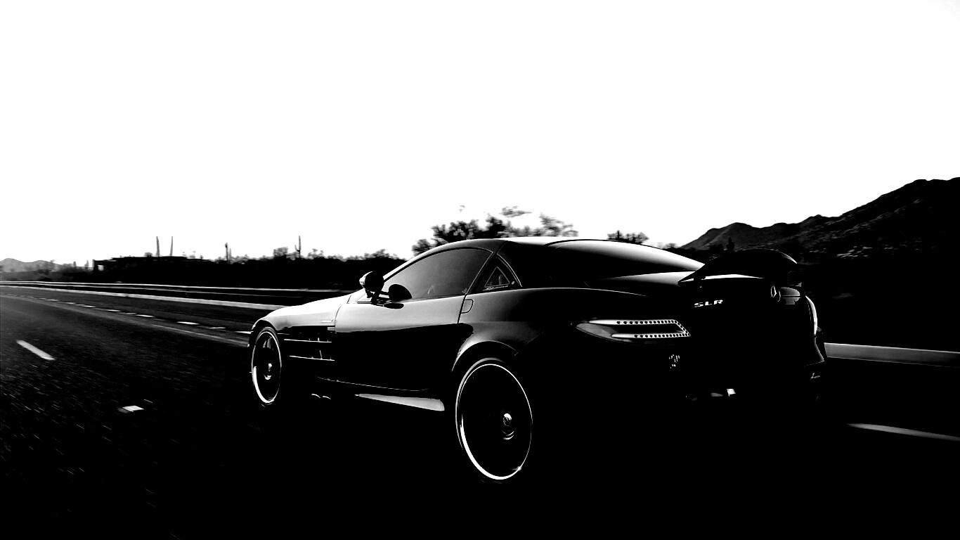 Черный автомобиль уезжает в закат обои