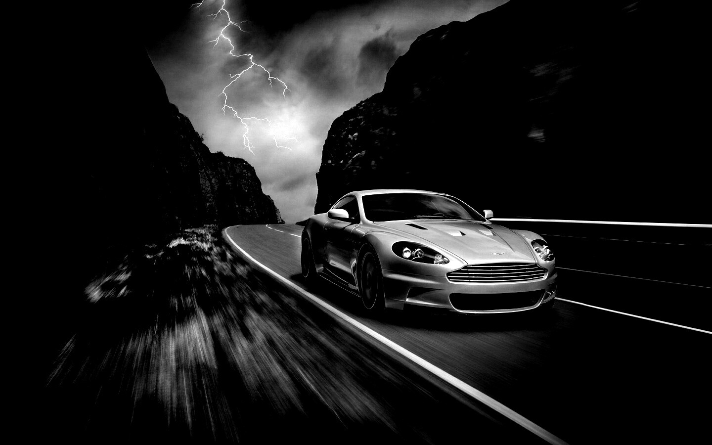 Астон мартин на горной дороге обои