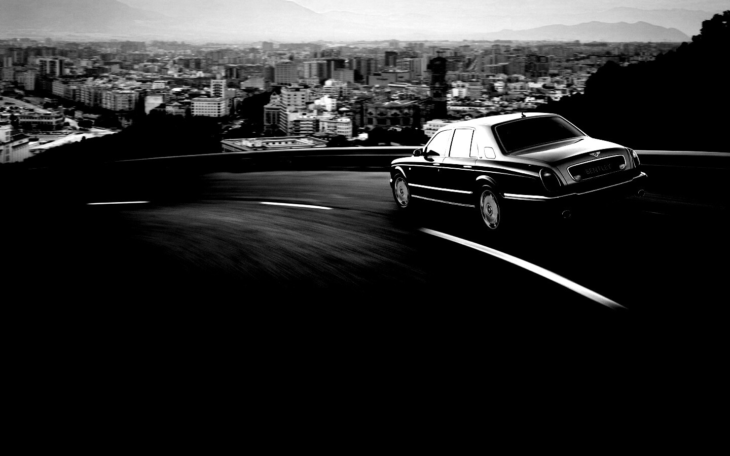 Черный Бентли на повороте обои