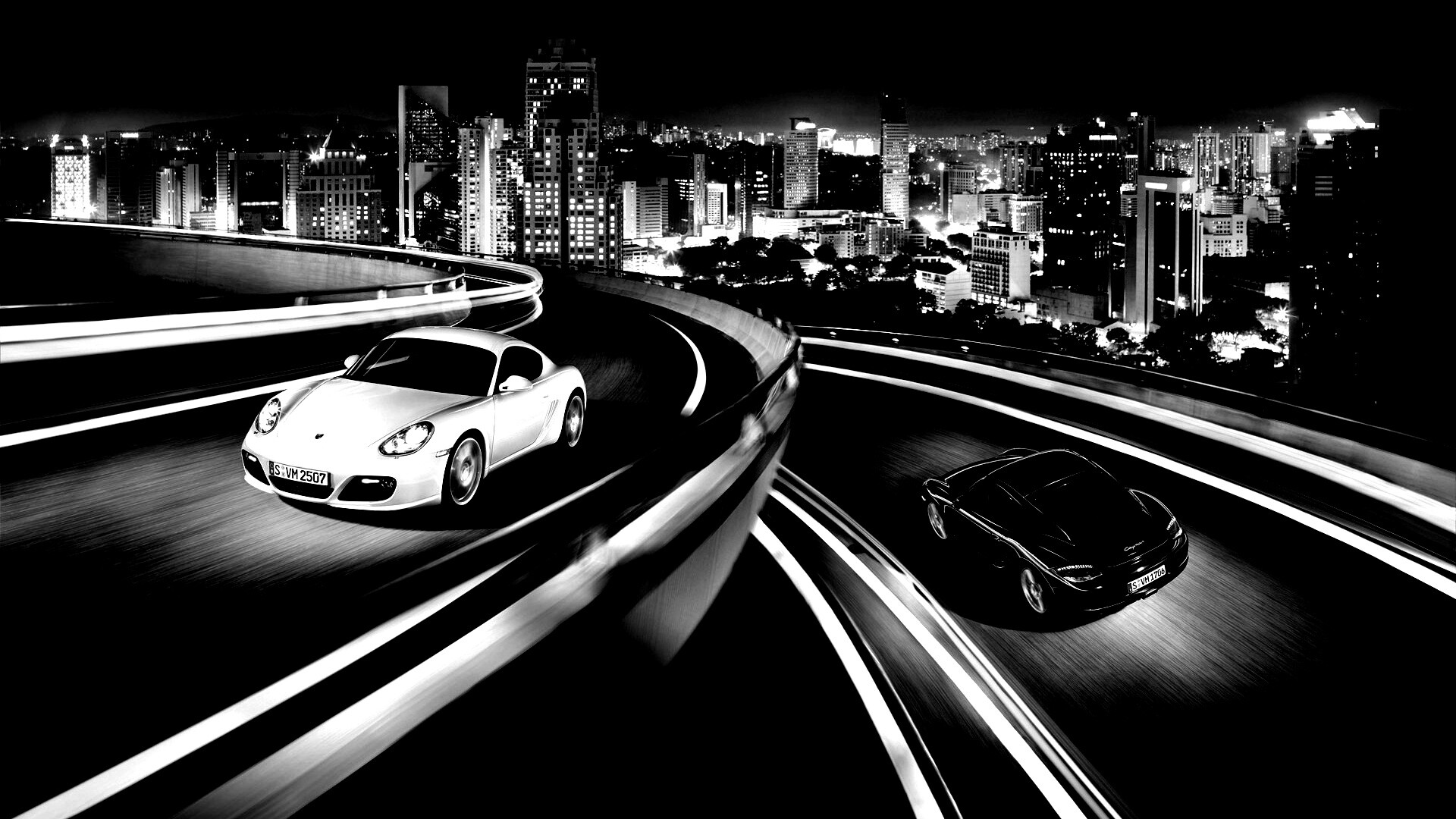 Черный и белый Porsche на автомагистрале. обои