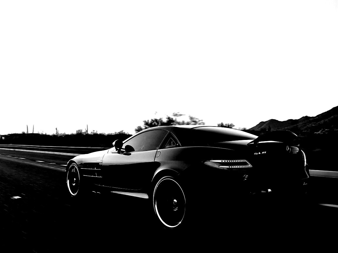 Черный автомобиль уезжает в закат обои