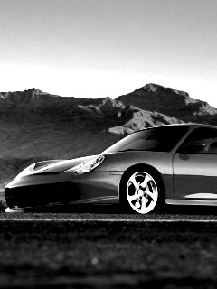 Красный Порше на фоне гор обои