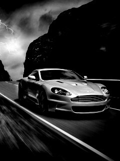Астон мартин на горной дороге обои
