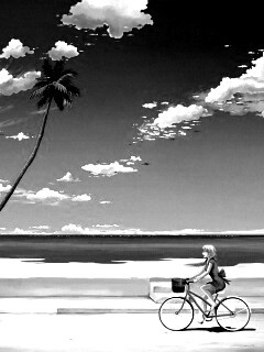 Девушка едет на велосипеде вдоль берега обои