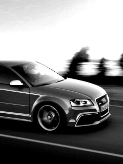 Красная Audi модели RS3 на дороге обои