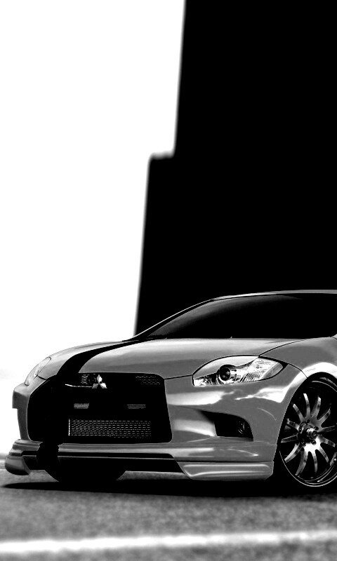 Mitsubishi жёлтого цвета с черными полосами обои