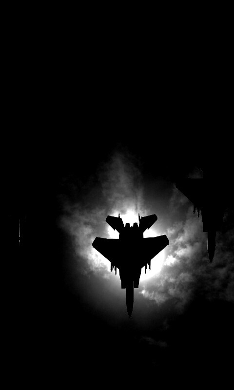 Ряд истрибителей на фоне солнца обои