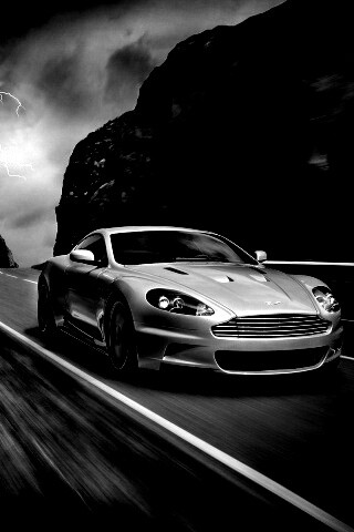 Астон мартин на горной дороге обои