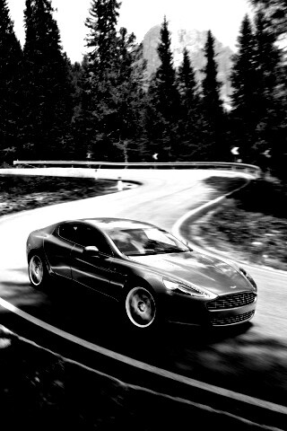 Астон мартин на лесной дороге обои