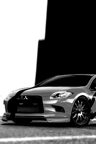 Mitsubishi жёлтого цвета с черными полосами обои