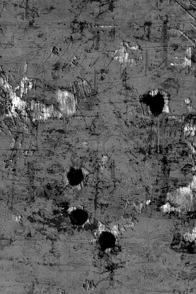 Пулевые отверстия в желтом листе обои