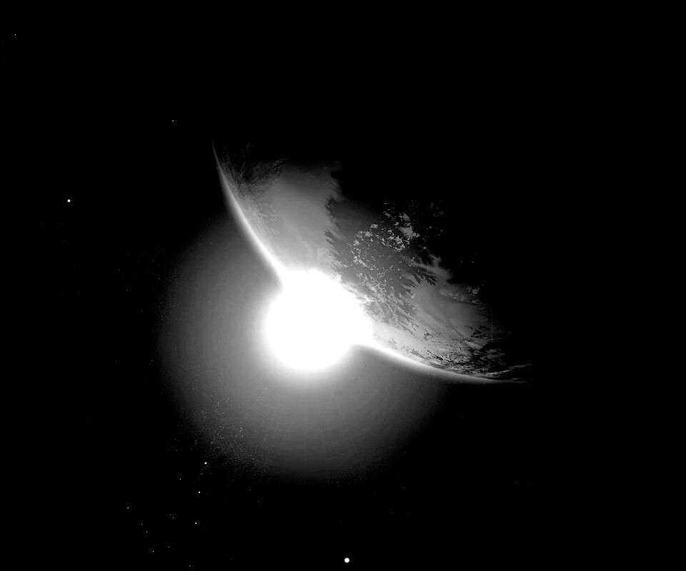 Солнце выглядывает из-за планеты обои