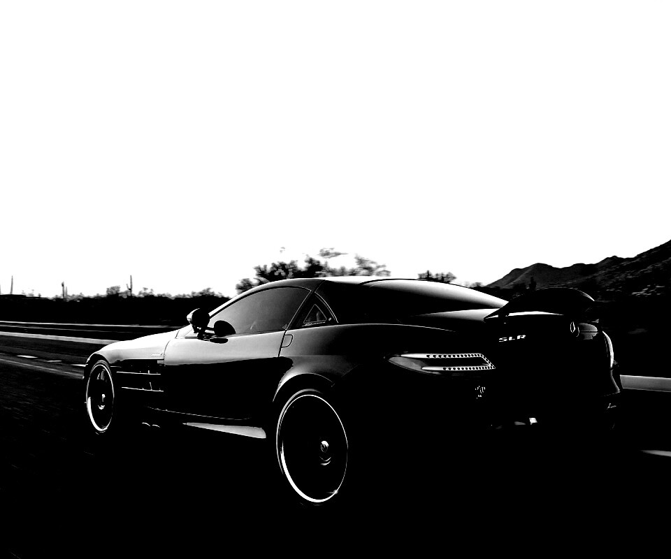 Черный автомобиль уезжает в закат обои