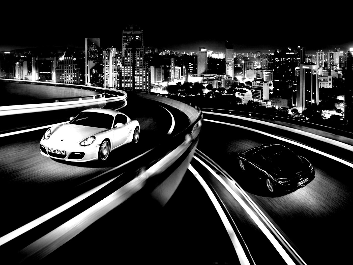 Черный и белый Porsche на автомагистрале. обои