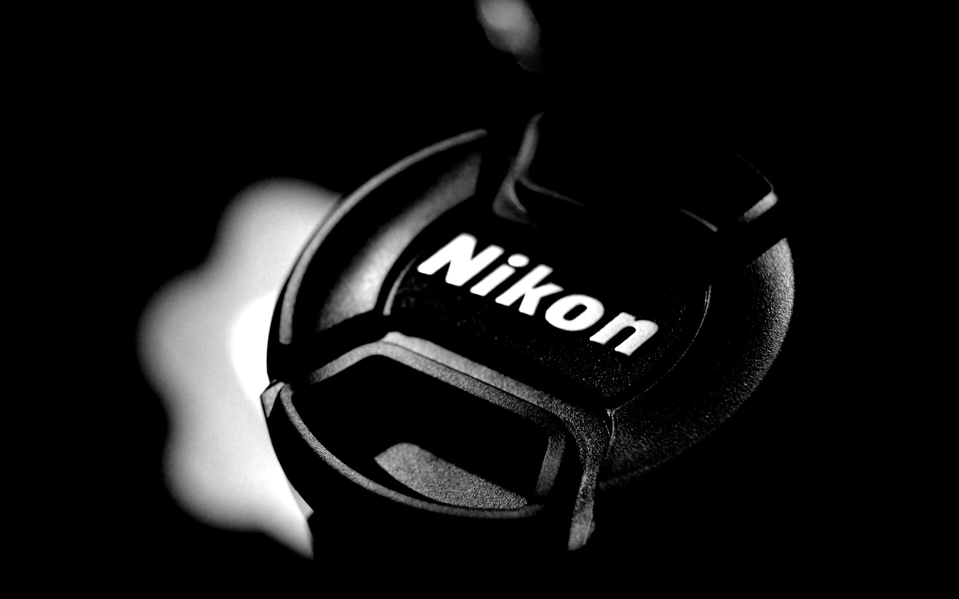 Крышечка от объектива Nikon обои
