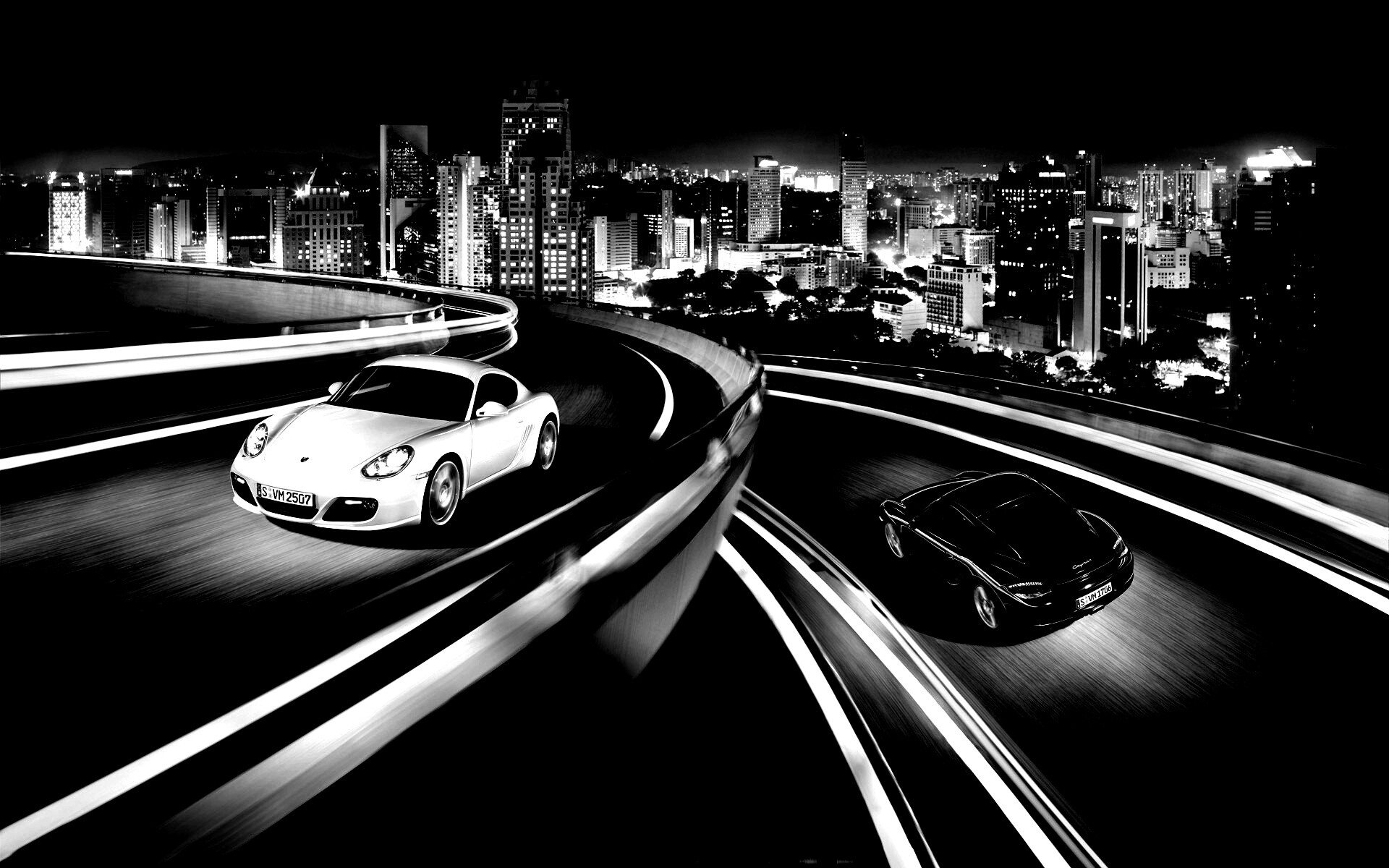 Черный и белый Porsche на автомагистрале. обои