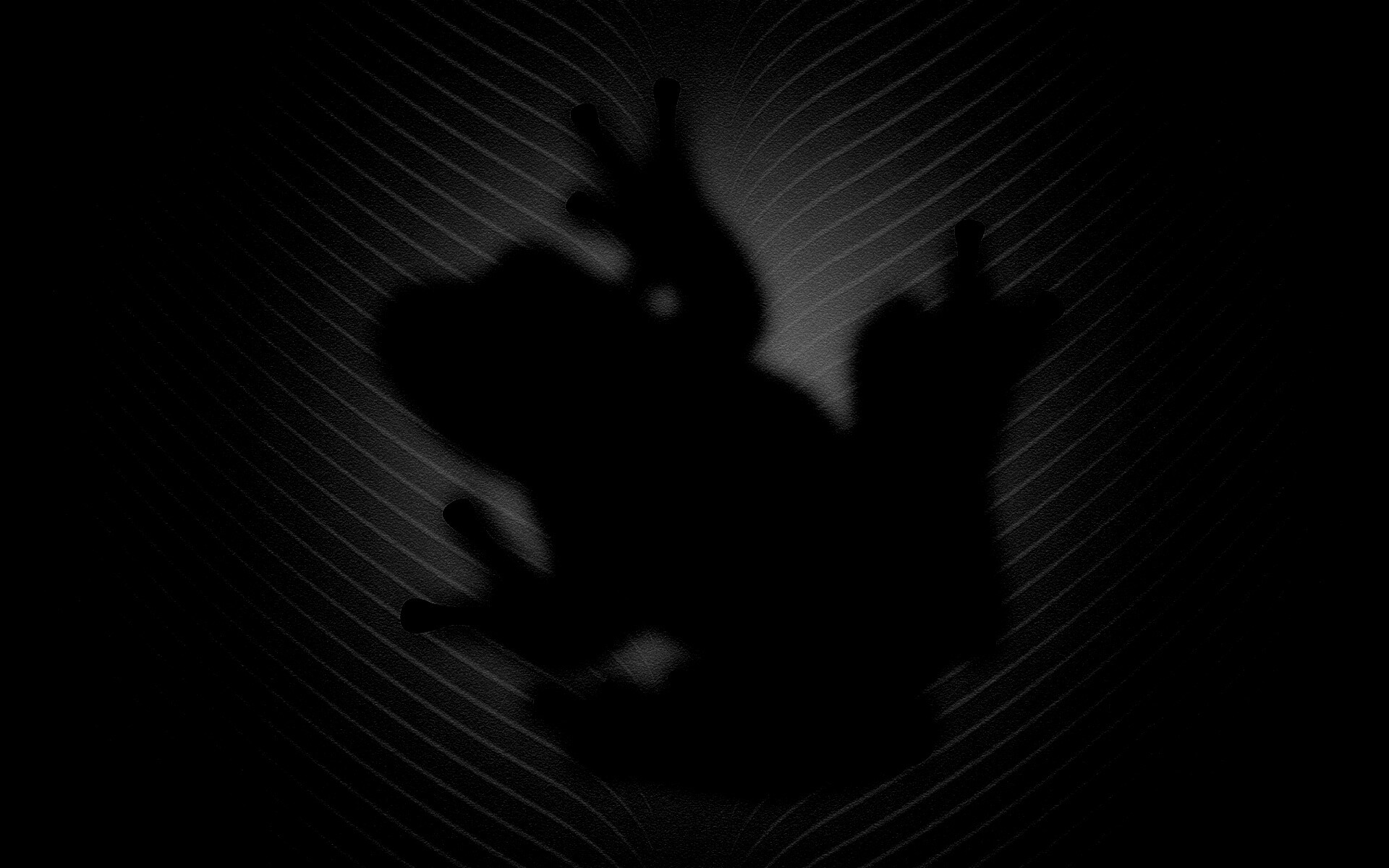 Силуэт лягушки просвечивает сквозь зеленый лист обои