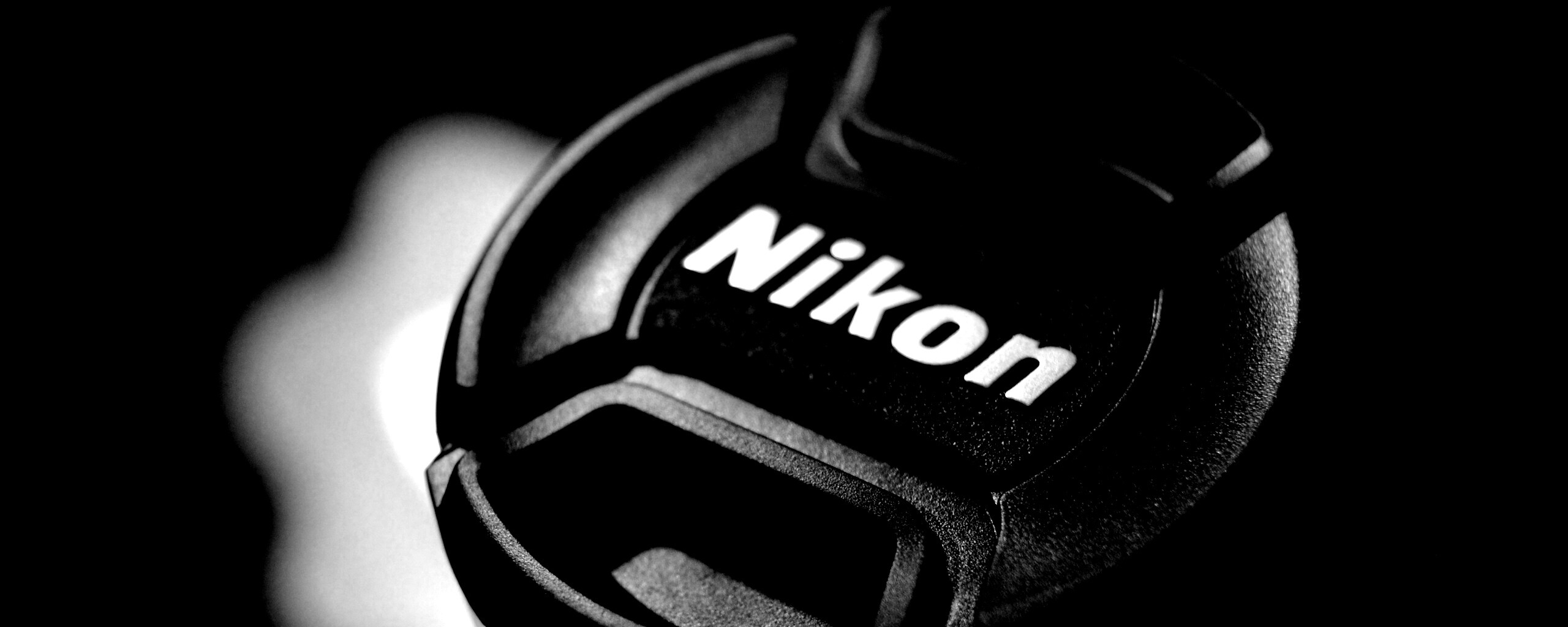 Крышечка от объектива Nikon обои