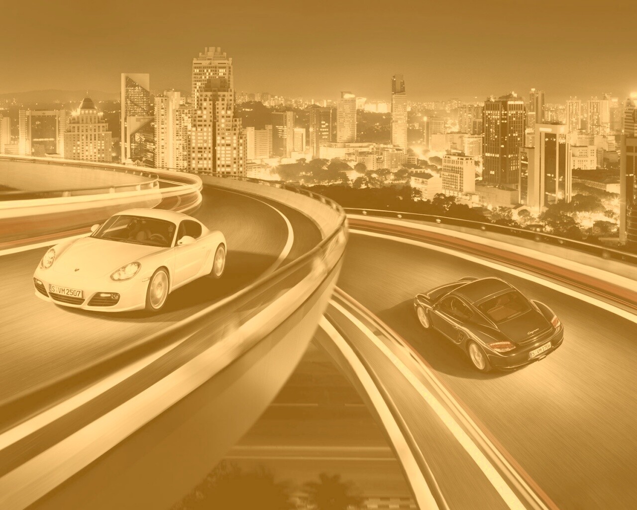 Черный и белый Porsche на автомагистрале. обои