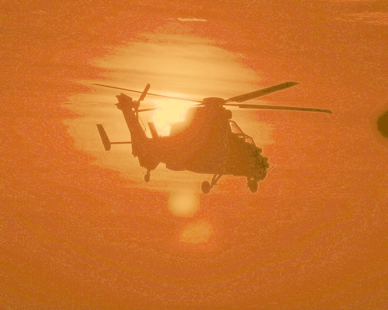 Вертолет в лучах закатного солнца обои