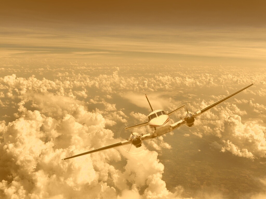 Самолет над облаками обои