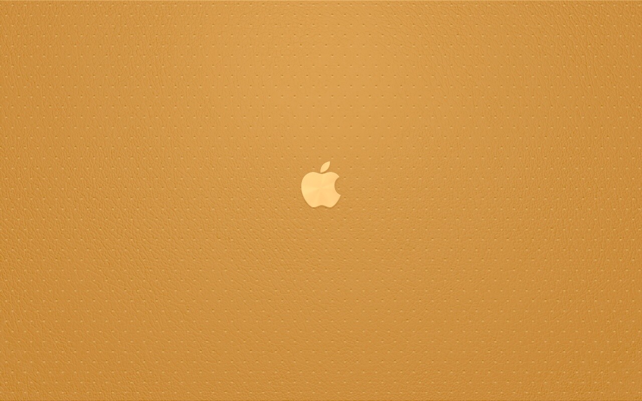Маленький логотип Apple на перфорированной коже обои