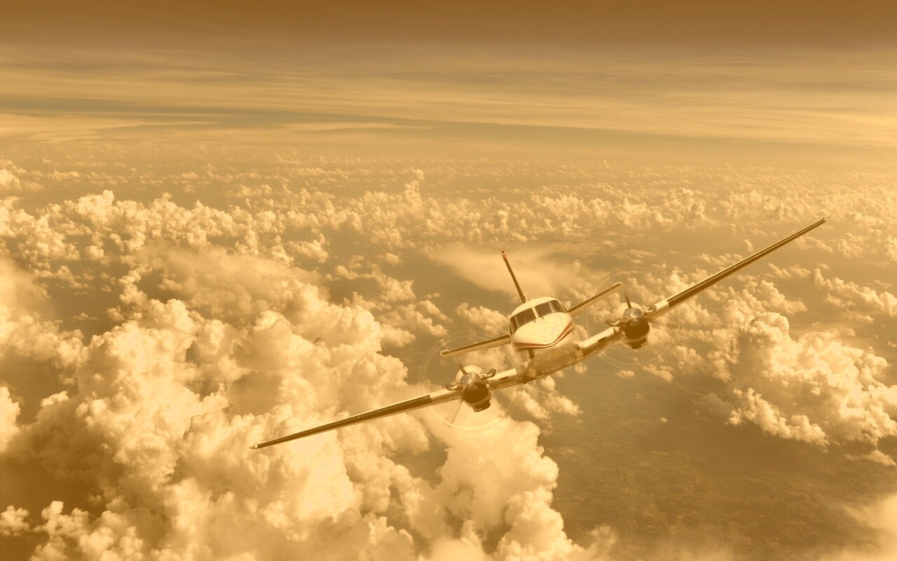 Самолет над облаками обои