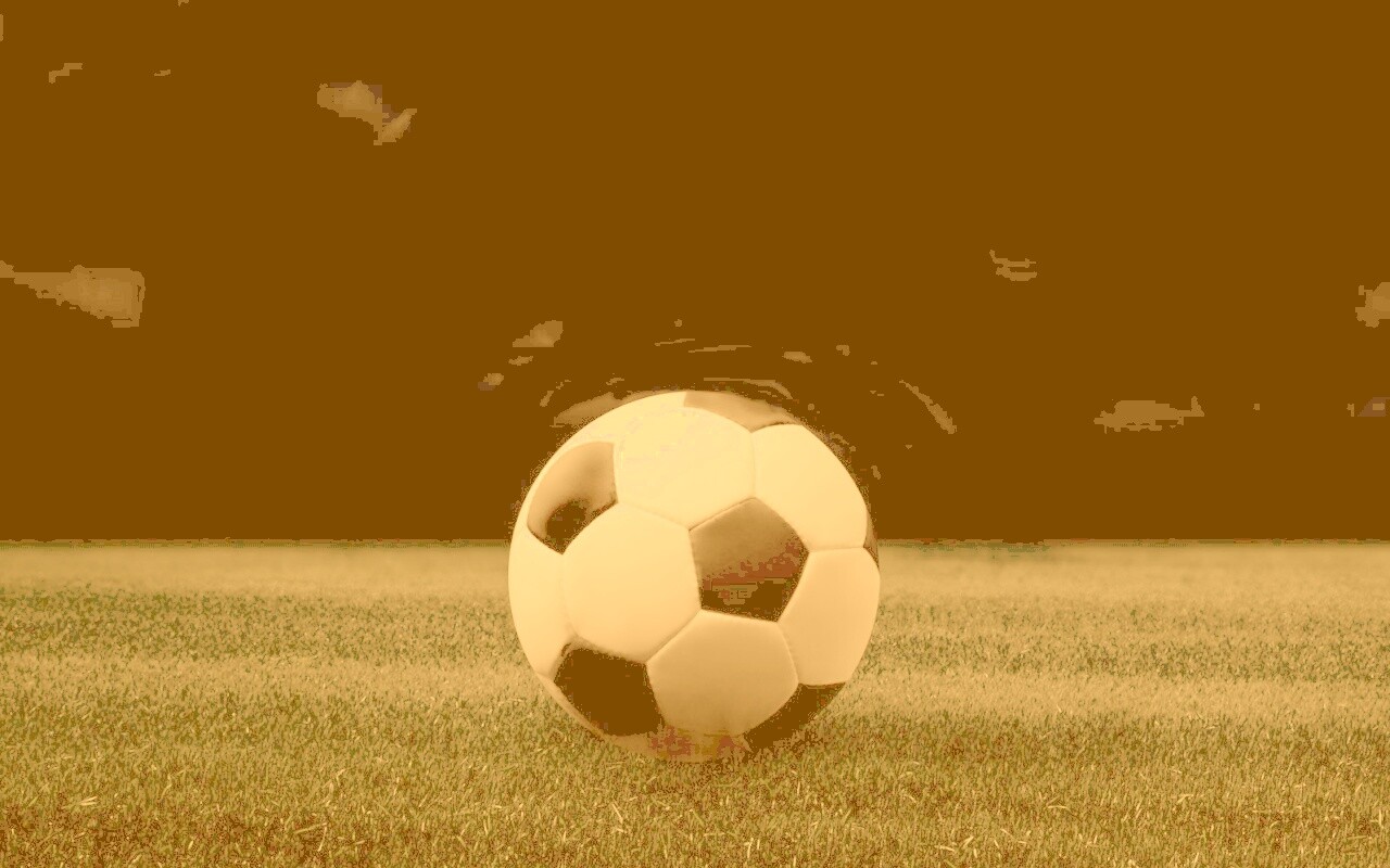 Футбольный мяч на темном поле обои