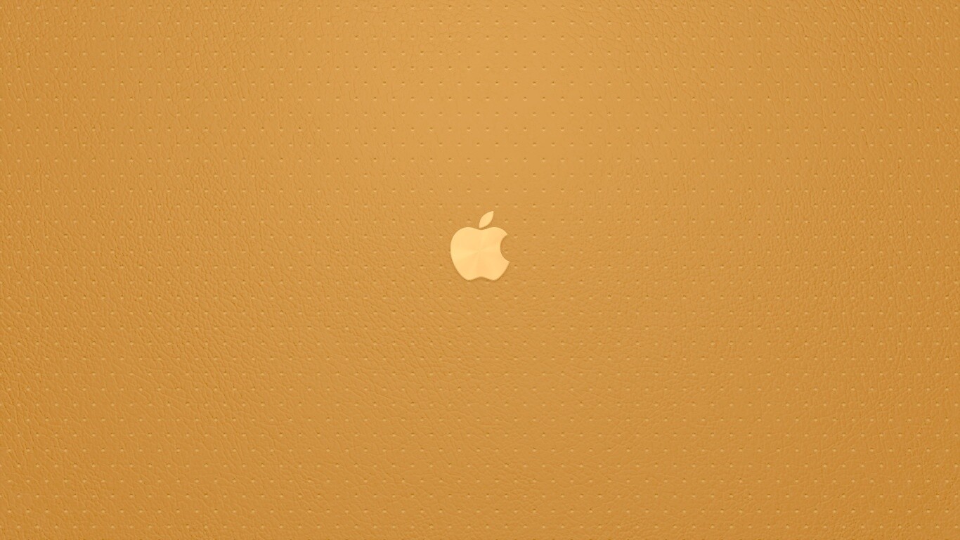 Маленький логотип Apple на перфорированной коже обои