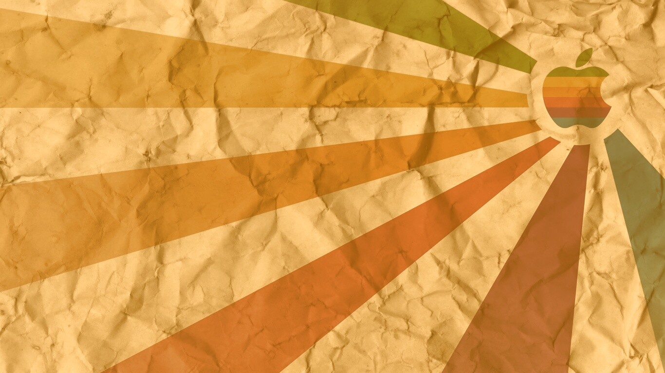 Радужный логотип Apple на мятой бумаге обои