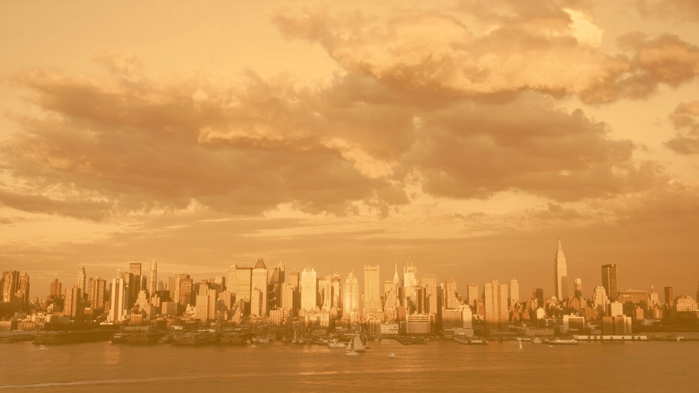 Панорама города на закате обои