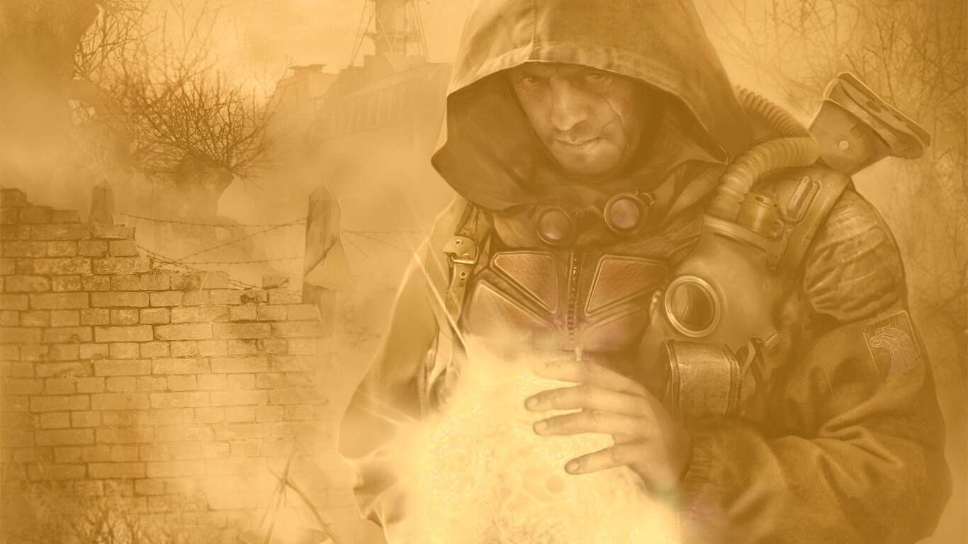 Сталкер с энергетическим артефактом в руках обои