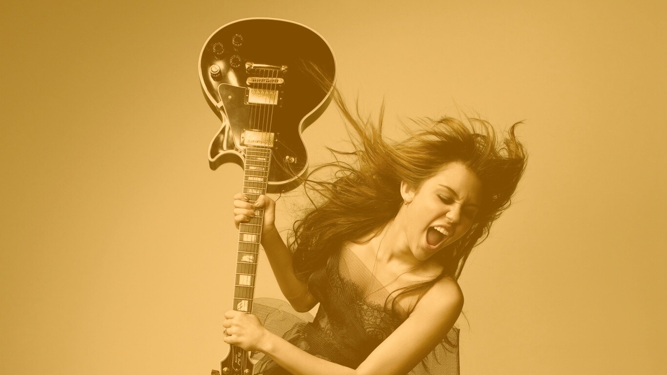 Miley Cyrus разбивает гитару обои