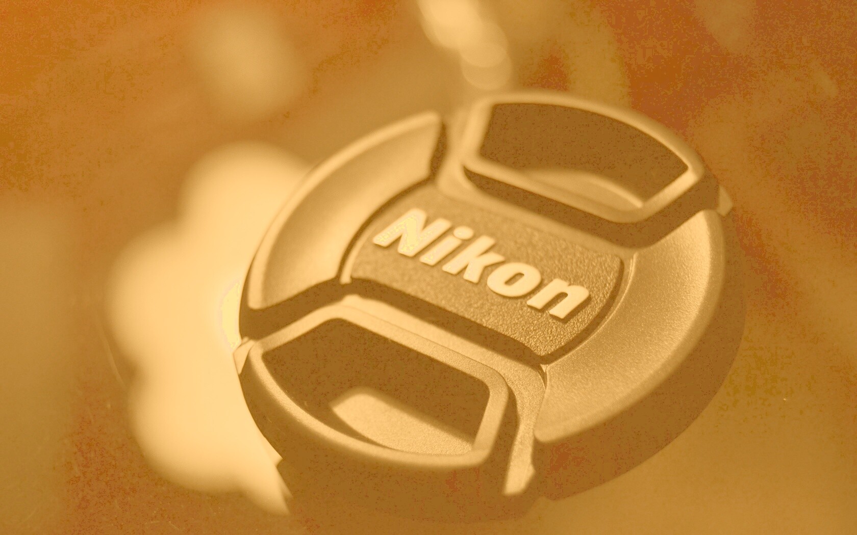 Крышечка от объектива Nikon обои