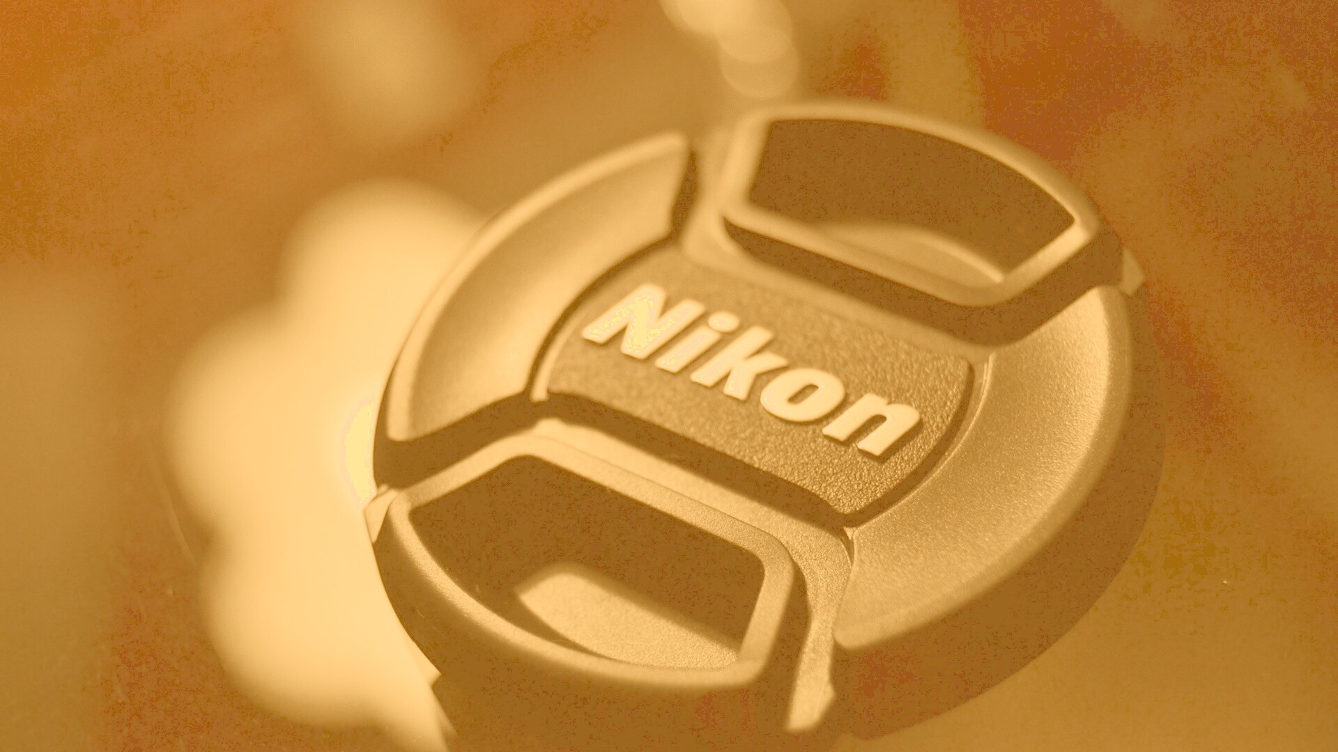 Крышечка от объектива Nikon обои