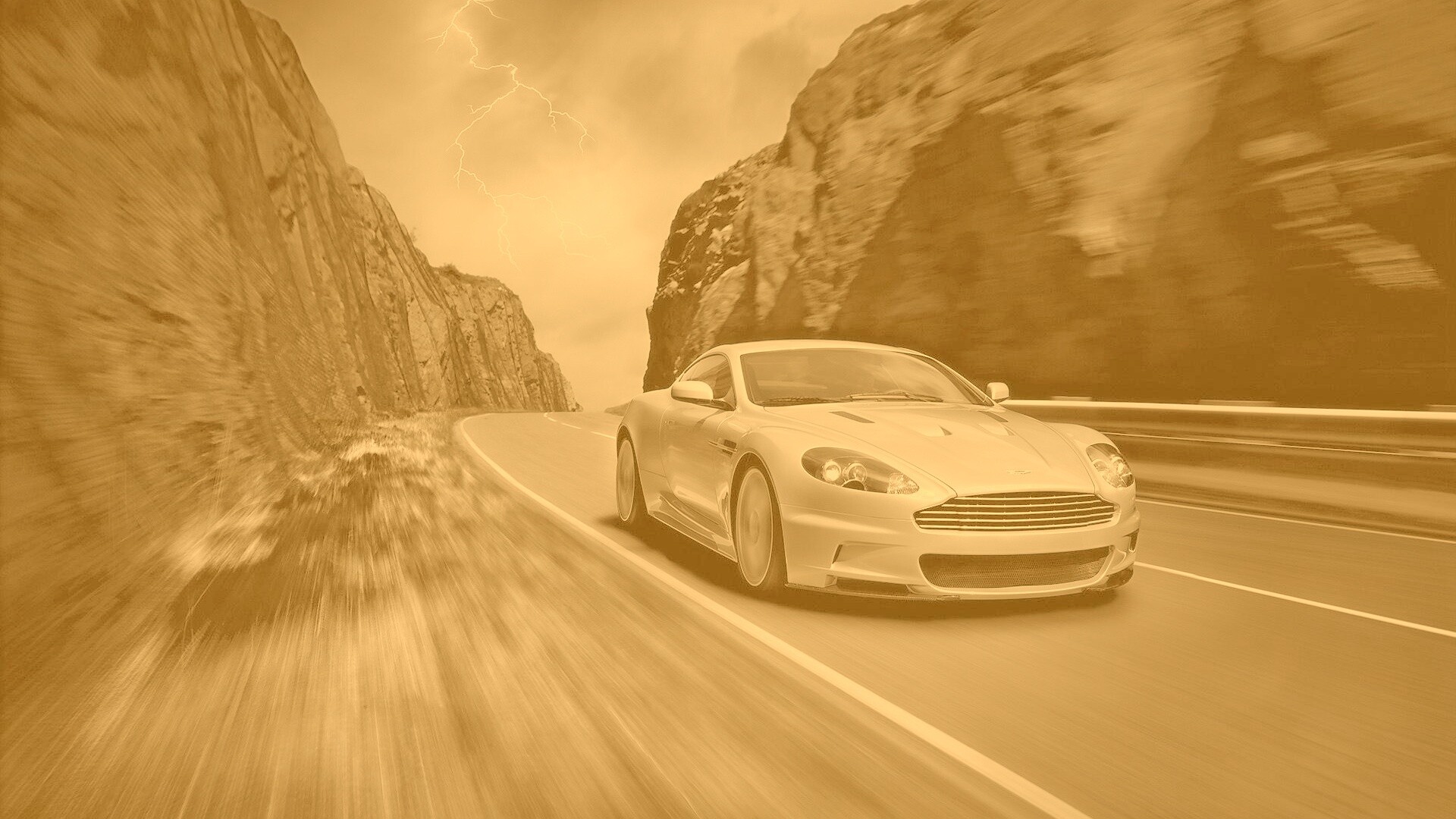 Астон мартин на горной дороге обои