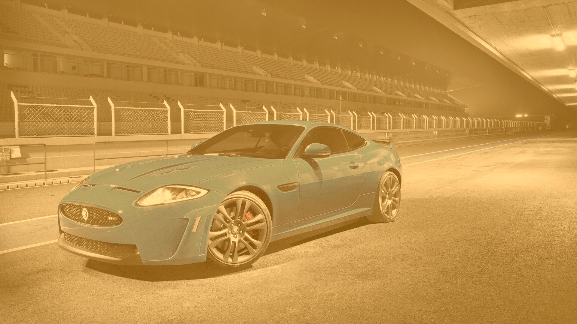 Синий спорткар на гоночном треке обои