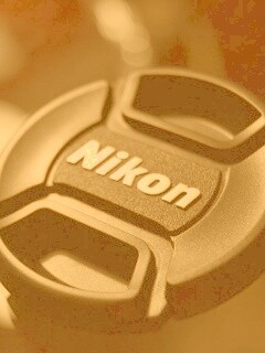 Крышечка от объектива Nikon обои