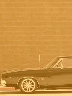 Черный Додж у стены обои