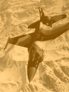 Истребитель над снежными пиками гор обои