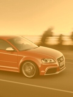 Красная Audi модели RS3 на дороге обои