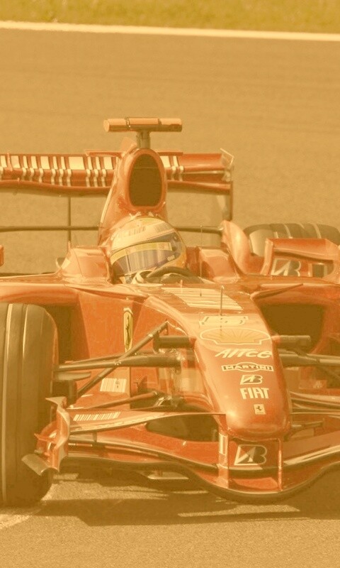 Болид Формула 1 на повороте обои