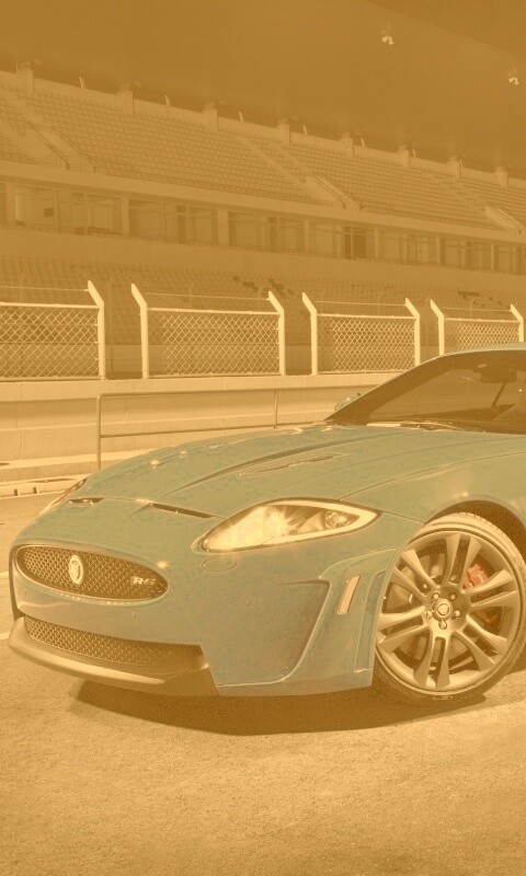 Синий спорткар на гоночном треке обои